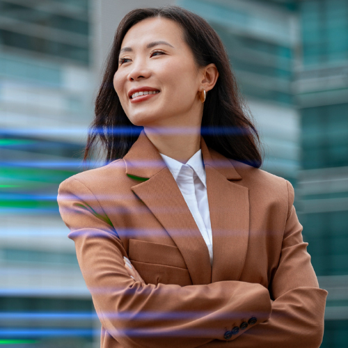 A woman confidently crosses her arms.